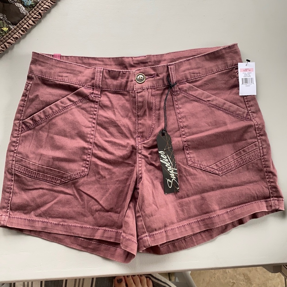 Brand new, tags still on shorts. Maroon color. Size 10